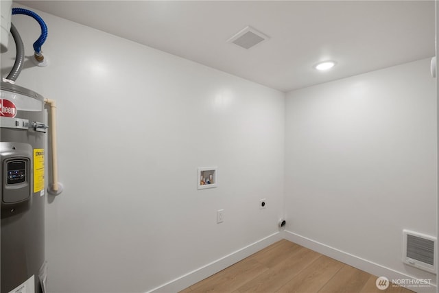 laundry area featuring visible vents, hookup for an electric dryer, hookup for a washing machine, and laundry area