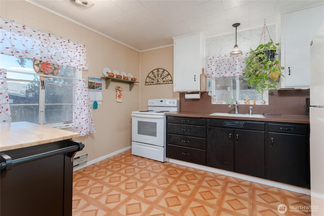 kitchen with electric range, ornamental molding, white cabinetry, a sink, and dark cabinetry