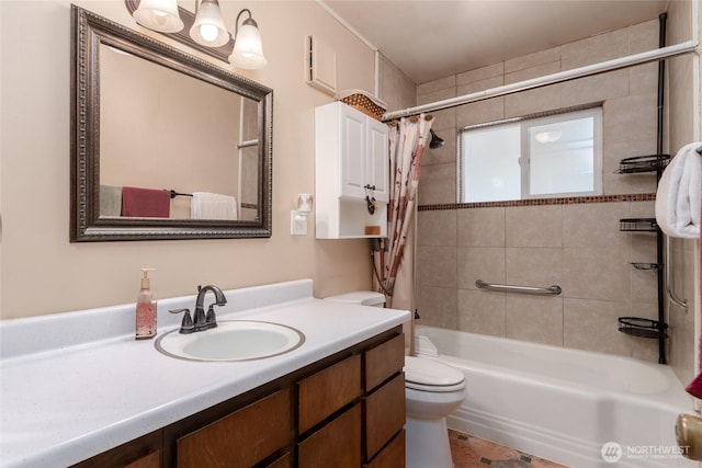 bathroom featuring shower / tub combo, vanity, and toilet