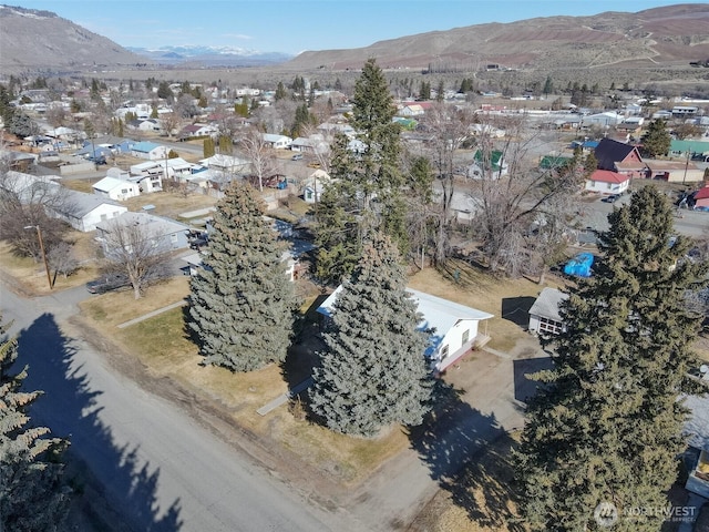 drone / aerial view with a residential view and a mountain view