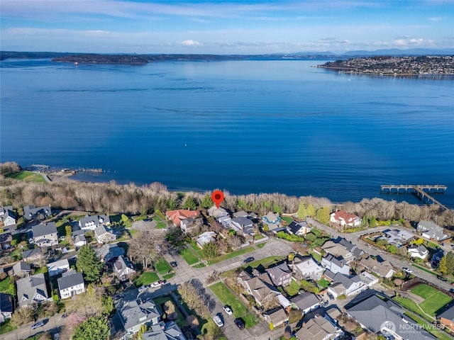 aerial view featuring a residential view and a water view