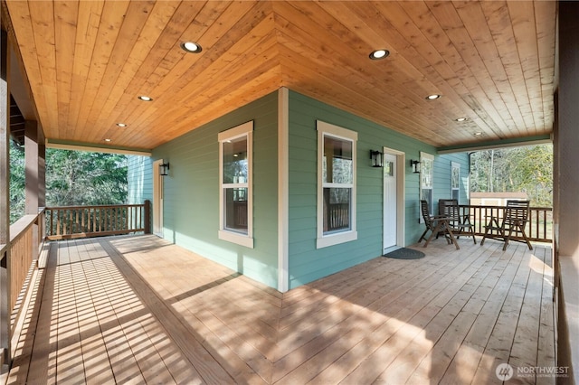 wooden deck featuring covered porch