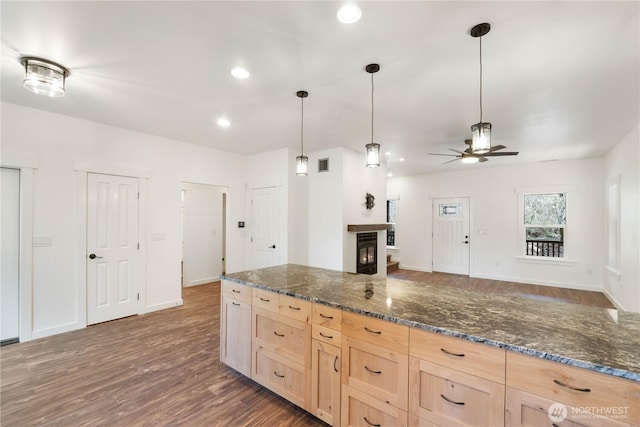 kitchen with visible vents, dark wood-style floors, light brown cabinets, pendant lighting, and recessed lighting