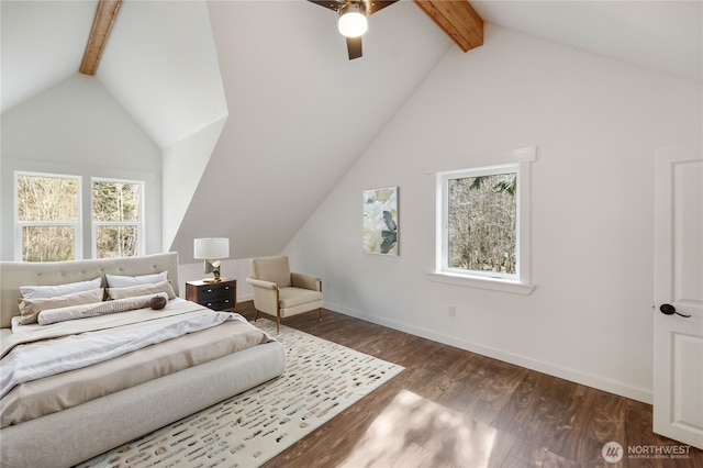 bedroom featuring vaulted ceiling with beams, multiple windows, and dark wood finished floors