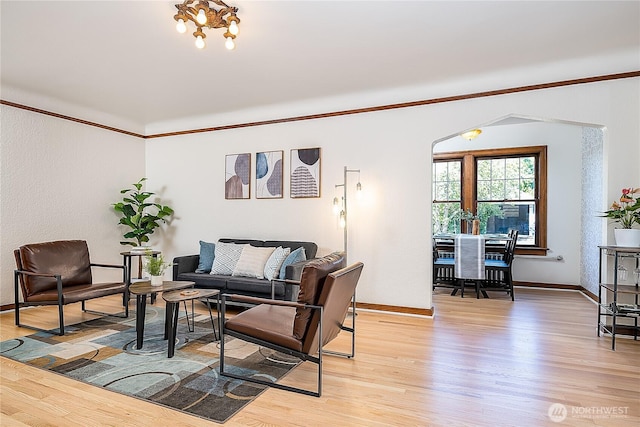 living room featuring light wood-style floors and baseboards