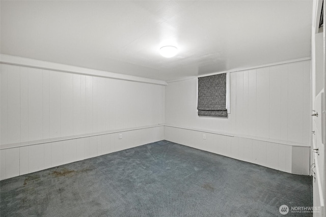 below grade area featuring carpet flooring