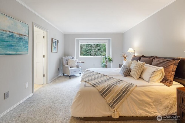 bedroom with ornamental molding, baseboards, and light carpet