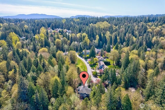 3140 240th Ave NE, Sammamish, WA 98074 - birds eye view of property featuring a view of trees and a mountain view