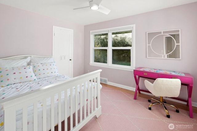 bedroom featuring visible vents, a ceiling fan, and baseboards