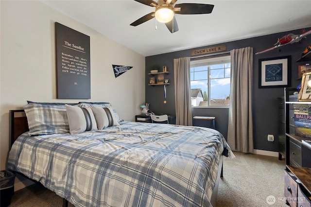 bedroom featuring carpet flooring, baseboards, a ceiling fan, and vaulted ceiling