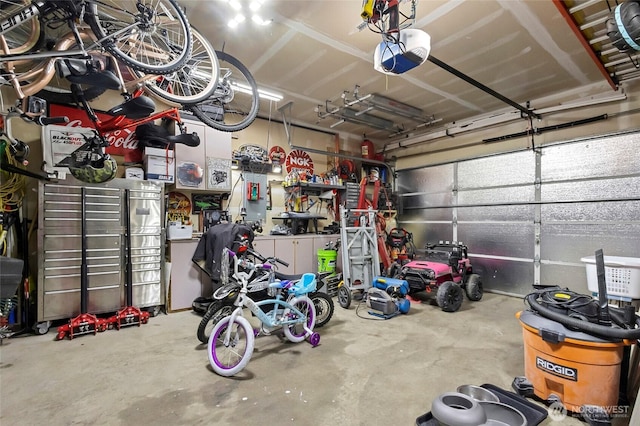 garage featuring a garage door opener