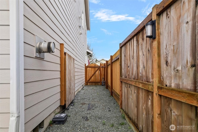 view of home's exterior featuring fence