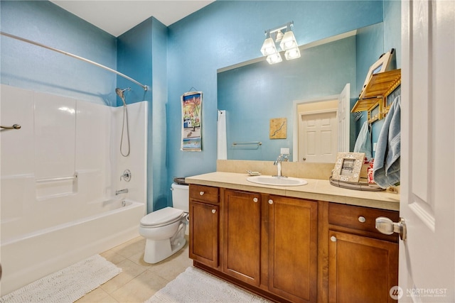 full bath featuring toilet, tile patterned flooring, tub / shower combination, and vanity