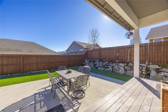 view of patio / terrace featuring a fenced backyard and outdoor dining space