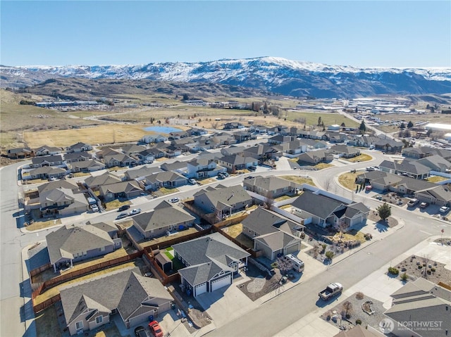 bird's eye view with a residential view and a mountain view