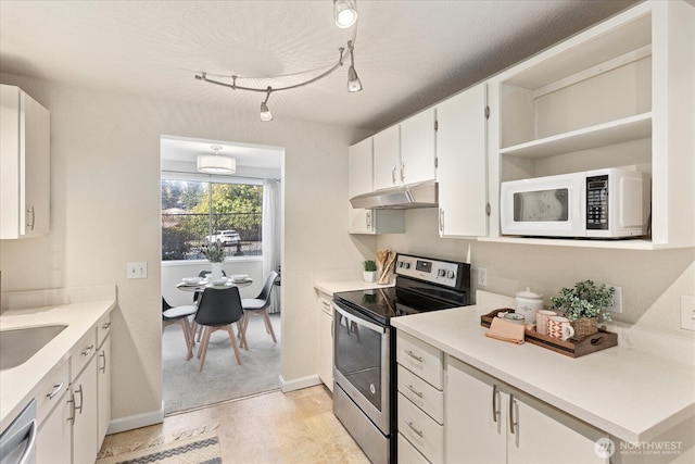 kitchen featuring open shelves, stainless steel appliances, light countertops, white cabinetry, and under cabinet range hood