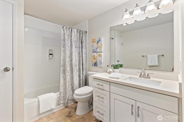 full bathroom with shower / tub combo, vanity, and toilet