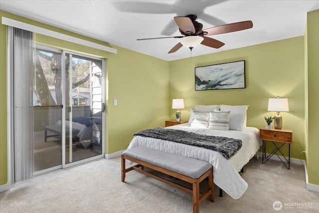 bedroom with access to exterior, carpet, baseboards, and a ceiling fan