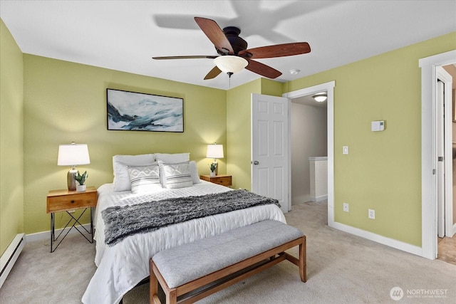 bedroom featuring a baseboard heating unit, light colored carpet, ceiling fan, and baseboards