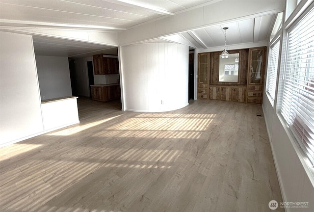 unfurnished room with wood finished floors