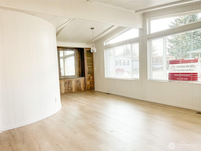 11436 SE 208th St Unit 106, Kent, WA 98031 - empty room with wood finished floors and beamed ceiling