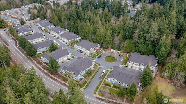 bird's eye view with a residential view and a forest view