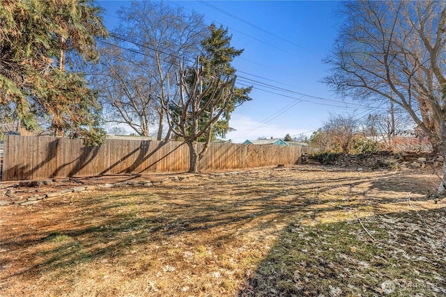 view of yard with fence