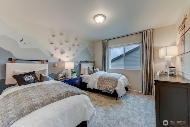 carpeted bedroom featuring baseboards