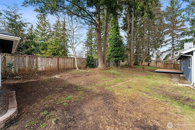 view of yard featuring a fenced backyard