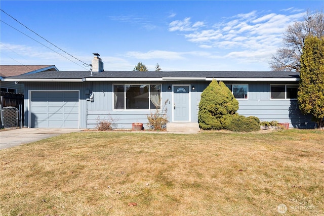 ranch-style home with a chimney, concrete driveway, an attached garage, a front yard, and fence