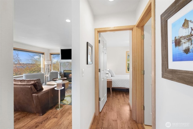 hallway with light wood-type flooring