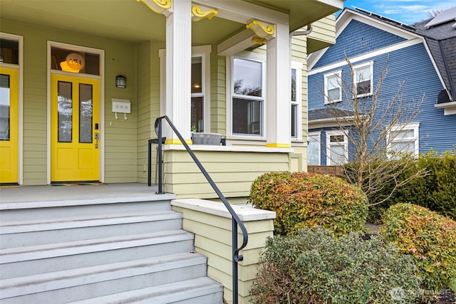 property entrance featuring covered porch