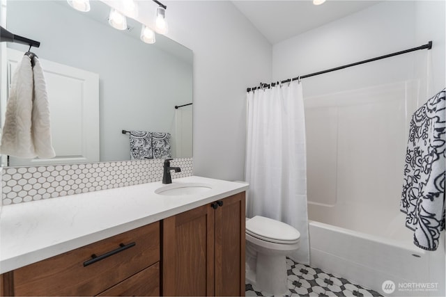 bathroom with toilet, shower / bathtub combination with curtain, backsplash, and vanity