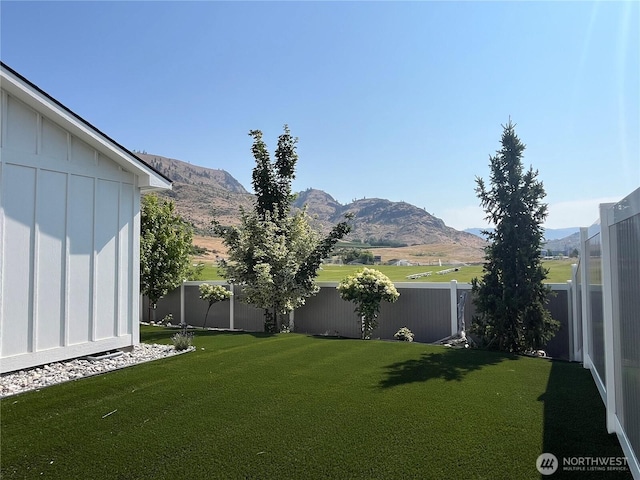 422 Sunny Brooke Ln, Chelan, WA 98816 - fenced backyard with a mountain view