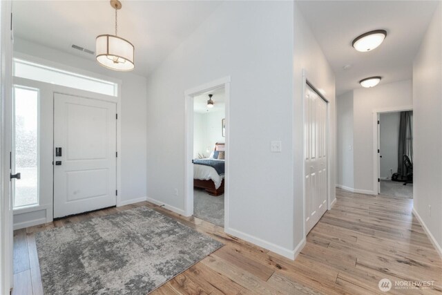 422 Sunny Brooke Ln, Chelan, WA 98816 - foyer with plenty of natural light and light wood finished floors