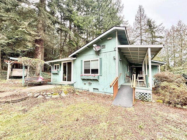 view of front of home featuring crawl space