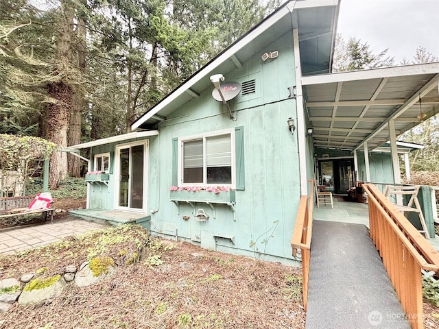 view of property exterior with crawl space