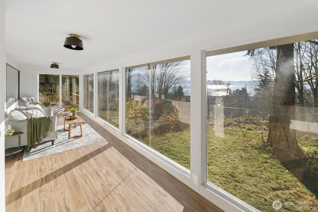 sunroom / solarium with a wealth of natural light