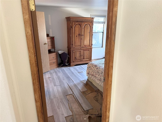 hallway with wood finished floors