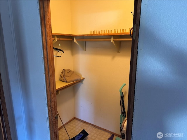 spacious closet featuring light floors