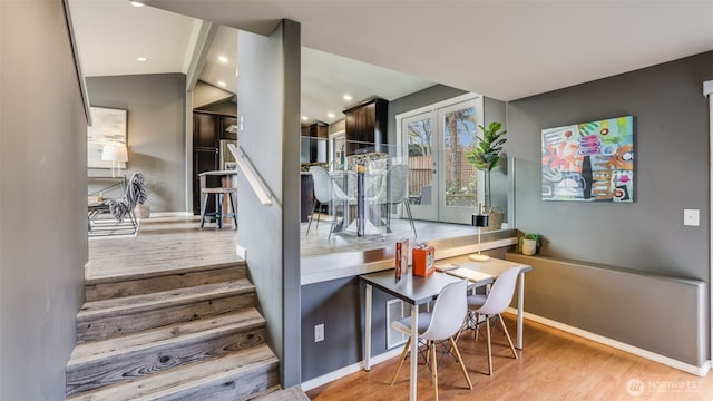 interior space with recessed lighting, baseboards, and wood finished floors