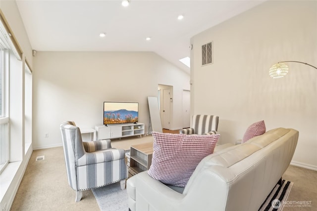 living area featuring visible vents, light carpet, recessed lighting, baseboards, and lofted ceiling