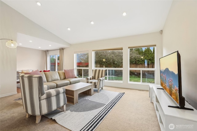 carpeted living area featuring visible vents, recessed lighting, baseboards, and vaulted ceiling