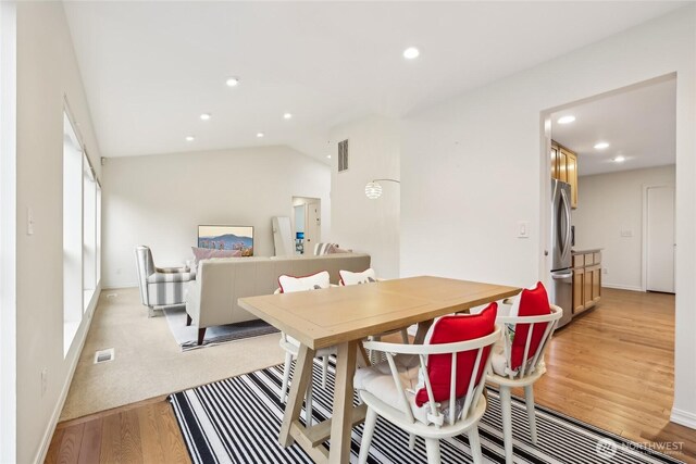 dining room with recessed lighting, visible vents, baseboards, and light wood-style floors