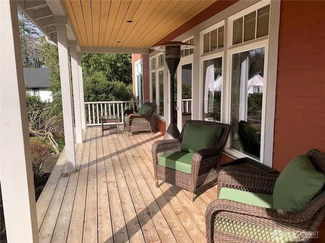 wooden terrace with covered porch