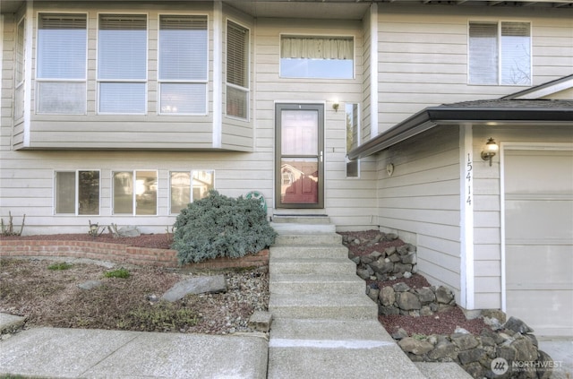 entrance to property with a garage