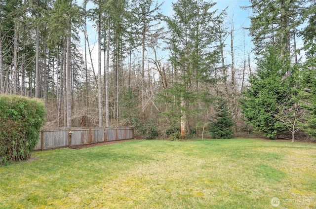 view of yard with fence