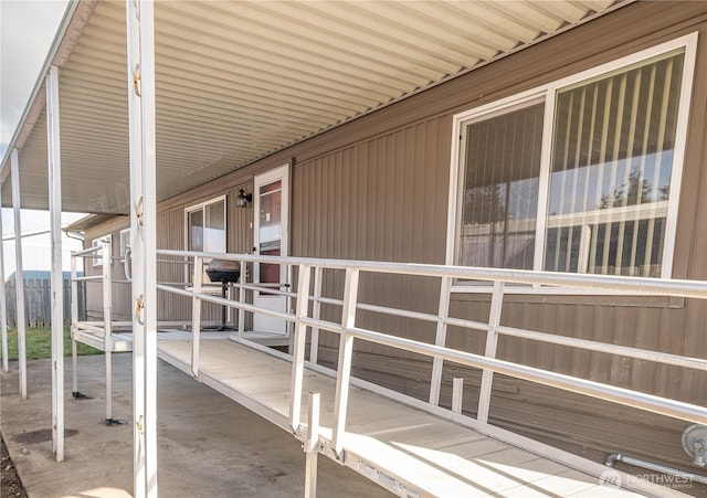 view of patio / terrace with an outbuilding and an exterior structure