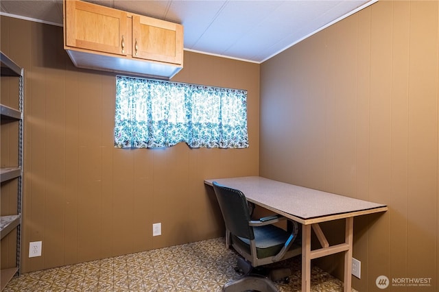 office space with crown molding and tile patterned floors