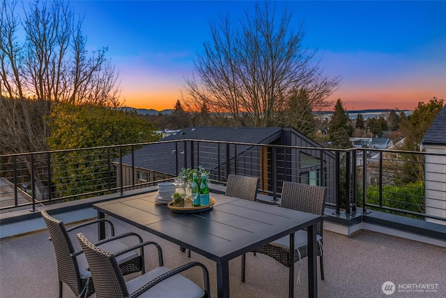 view of patio / terrace with outdoor dining space and a balcony